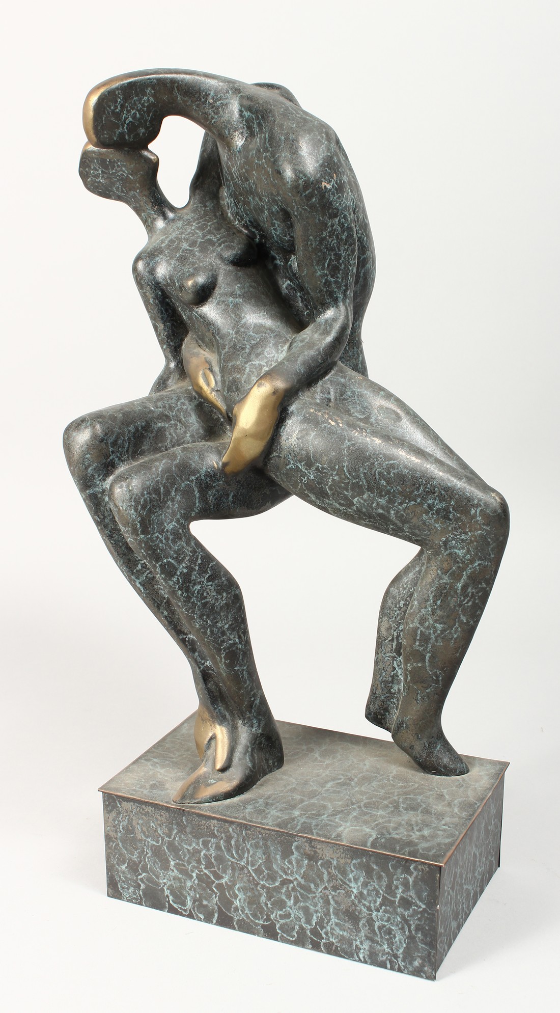 AN ABSTRACT BRONZE OF LOVERS. 17ins high.