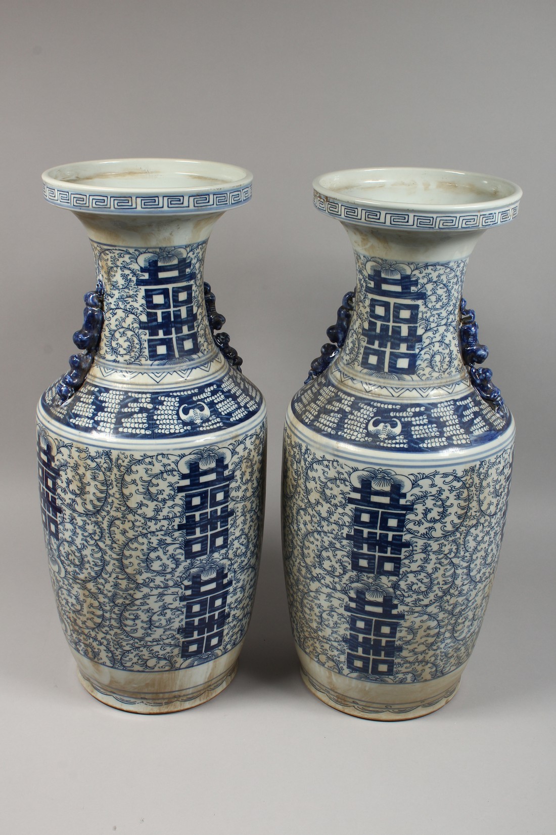 A PAIR OF CHINESE BLUE AND WHITE VASES. 23ins high. - Image 7 of 7