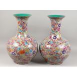 A GOOD PAIR OF CHINESE PORCELAIN MILLEFIORI BULBOUS VASES. 22ins high.