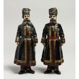 A GOOD PAIR OF RUSSIAN BRONZE FIGURES OF BEARDED MEN. 7ins