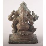 AN EARLY INDIAN BRONZE FIGURE OF GANESHA, 8cm high.