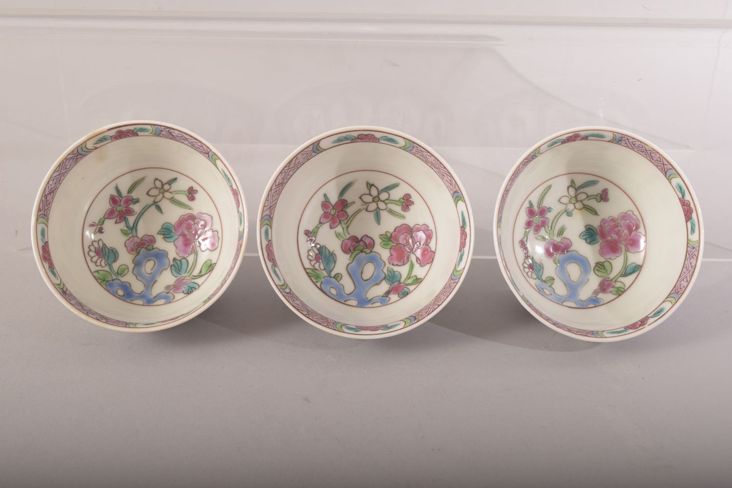 A SET OF THREE CHINESE FAMILLE ROSE PORCELAIN CUPS AND SAUCERS, cups 7.5cm diameter, saucer 12cm - Image 5 of 6