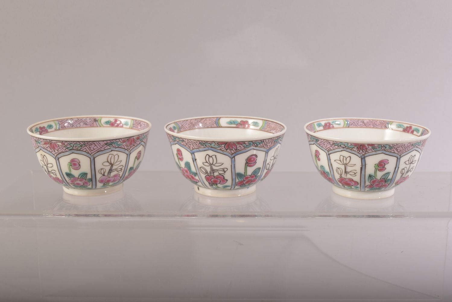 A SET OF THREE CHINESE FAMILLE ROSE PORCELAIN CUPS AND SAUCERS, cups 7.5cm diameter, saucer 12cm - Image 4 of 6