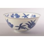 A CHINESE MING STYLE BLUE AND WHITE PORCELAIN BOWL, decorated with flowers, six character mark to