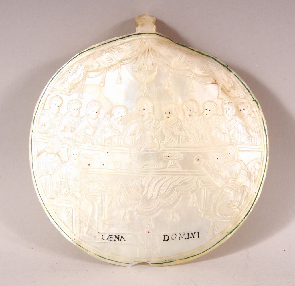 A FINE 18TH/19TH CENTURY JERUSALEM CARVED MOTHER OF PEARL SHELL, depicting the last supper, jesus