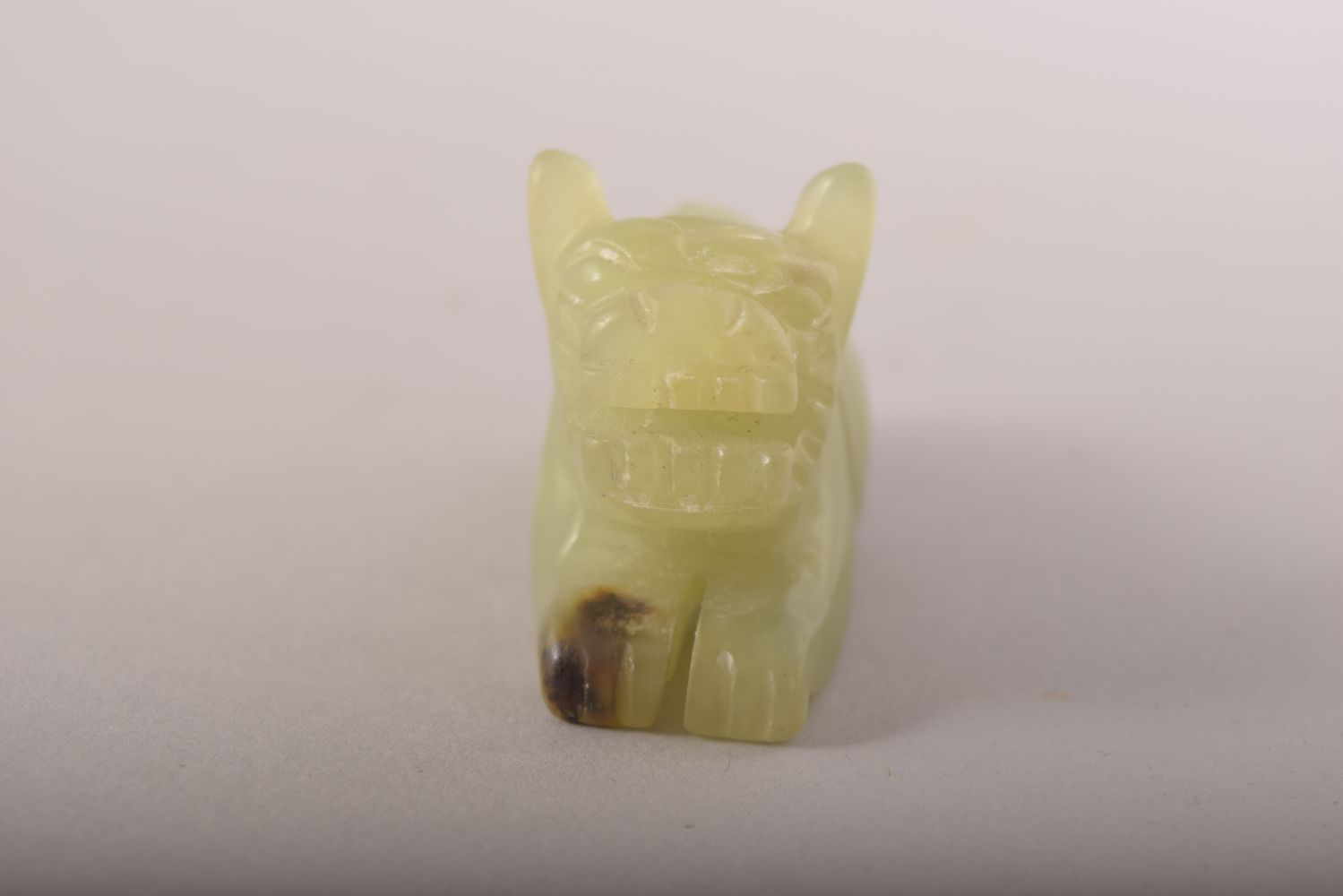 A SMALL CHINESE CARVED JADE FIGURE OF A BEAST, 6cm long. - Image 2 of 5