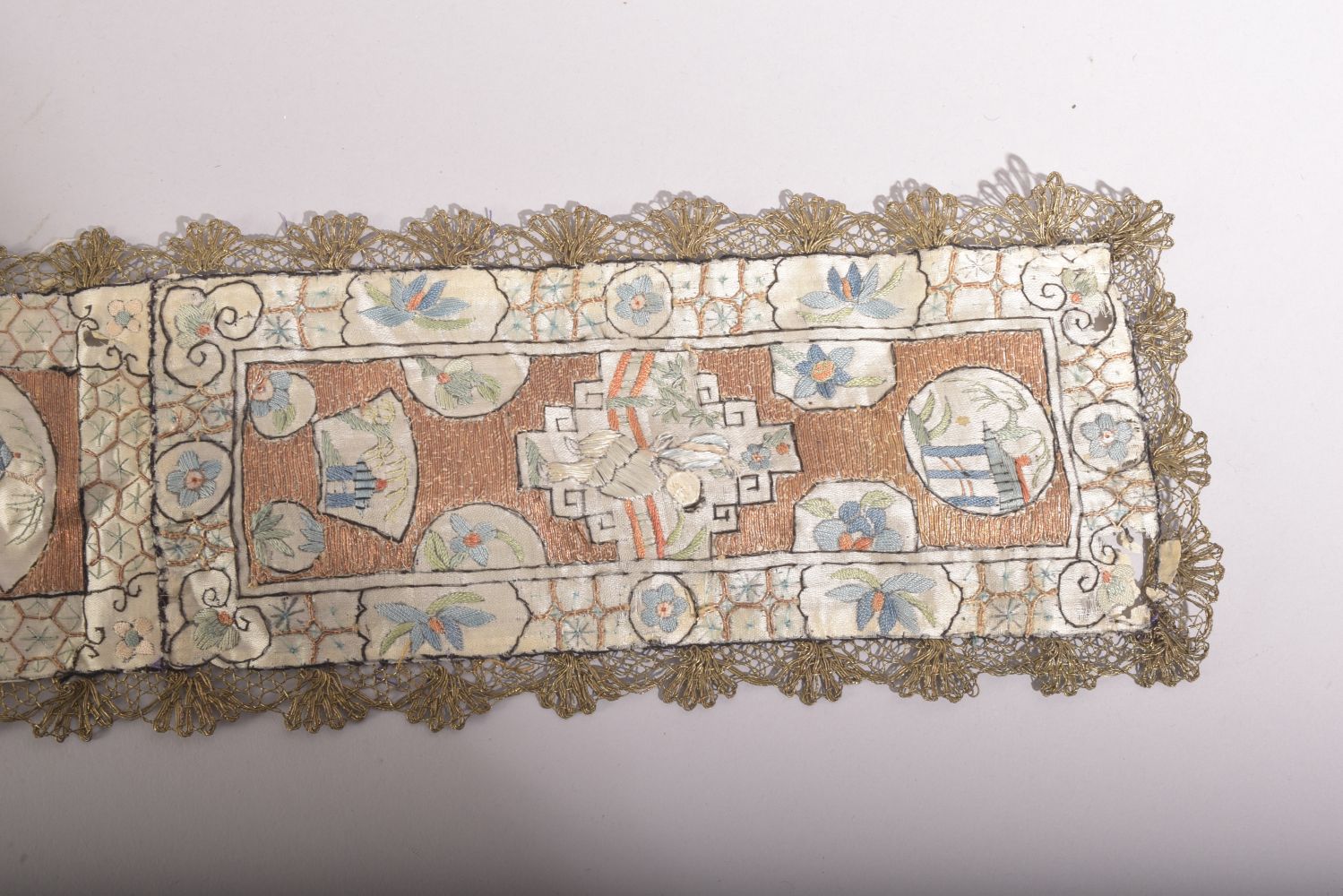 A CHINESE EMBROIDERED SILK TEXTILE, embroidered with various panels of figures, 96cm long. - Image 2 of 5