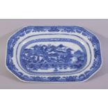 A CHINESE BLUE AND WHITE RECTANGULAR PORCELAIN DISH, the centre painted with a mountainous landscape