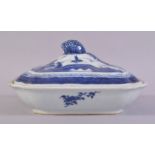 A CHINESE BLUE AND WHITE PORCELAIN TUREEN AND COVER, decorated with landscape scenes of buildings