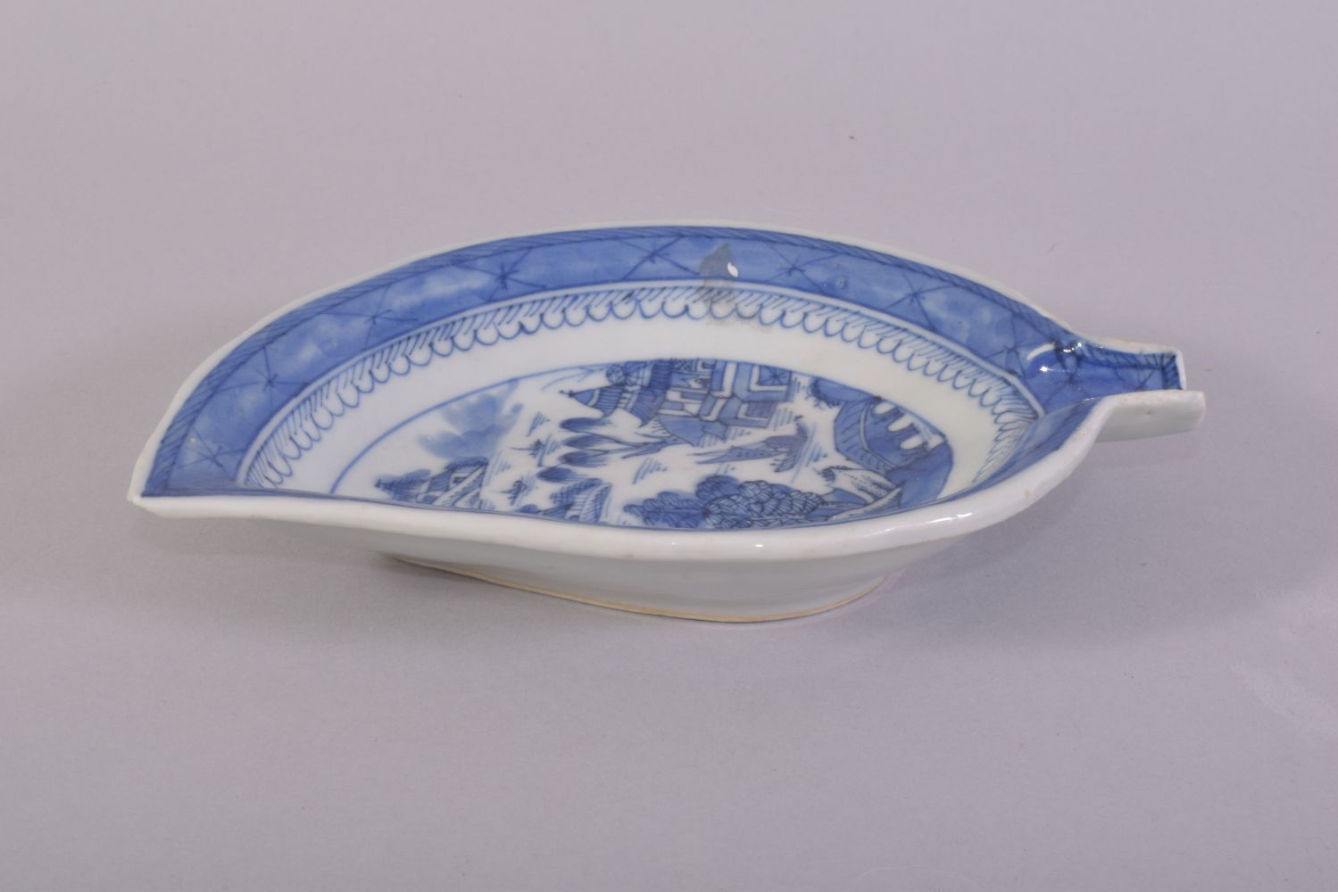 A CHINESE BLUE AND WHITE PORCELAIN LEAF SHAPE DISH, painted with a landscape setting, 17.5cm x - Image 2 of 3