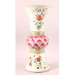 A GOOD TALL CHINESE FAMILLE ROSE GU SHAPE VASE, painted with flowers and birds, with bulbous central