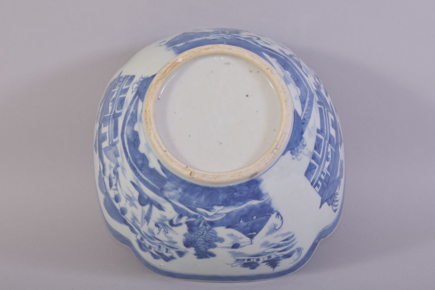 A CHINESE BLUE AND WHITE PORCELAIN BOWL, decorated with a landscape including buildings, boats and - Image 6 of 6