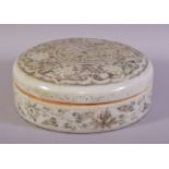 A LARGE CHINESE YUAN STYLE CIRCULAR BOX AND COVER, decorated floral motifs, 22cm diameter.