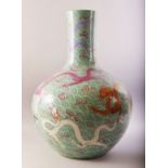 A LARGE AND IMPRESSIVE CHINESE TURQUOISE GROUND PORCELAIN VASE, decorated with multiple dragons