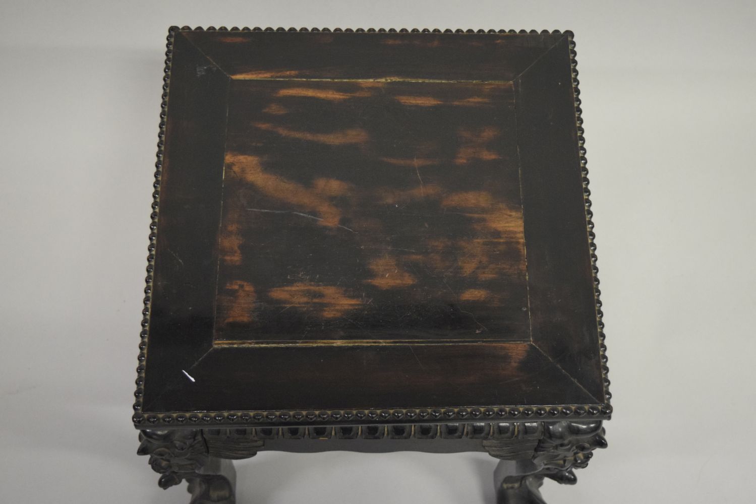 A SMALL CHINESE SQUARE FORM HARDWOOD TABLE, with carved floral frieze, supported on four curving - Image 2 of 6
