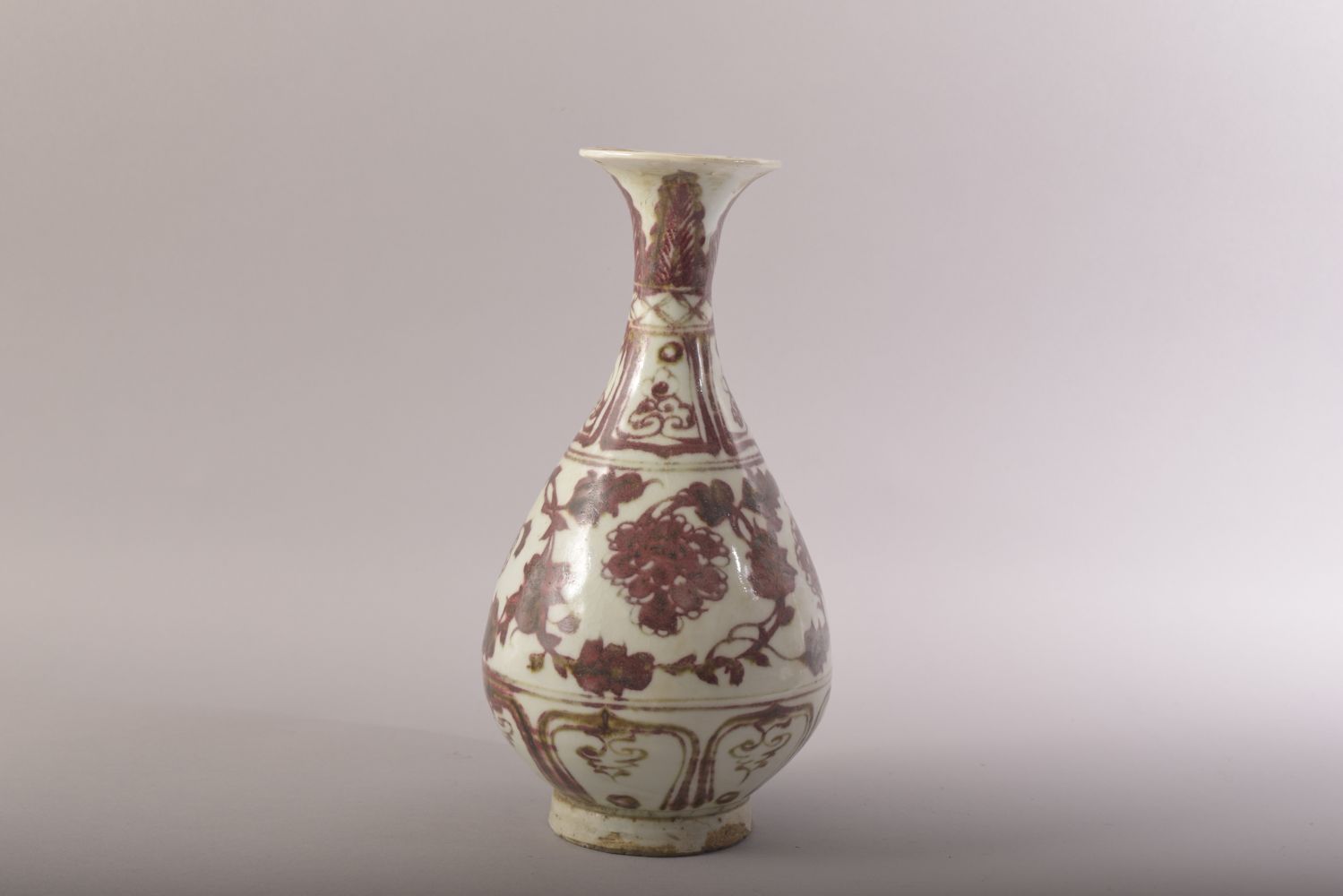 A CHINESE IRON RED AND WHITE GLAZED POTTERY VASE, decorated with floral motifs, 24.5cm high. - Image 4 of 6