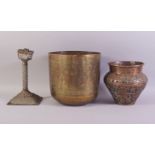 THREE ISLAMIC BRASS / METALWARE ITEMS, comprising a embossed and chased copper vase, an engraved