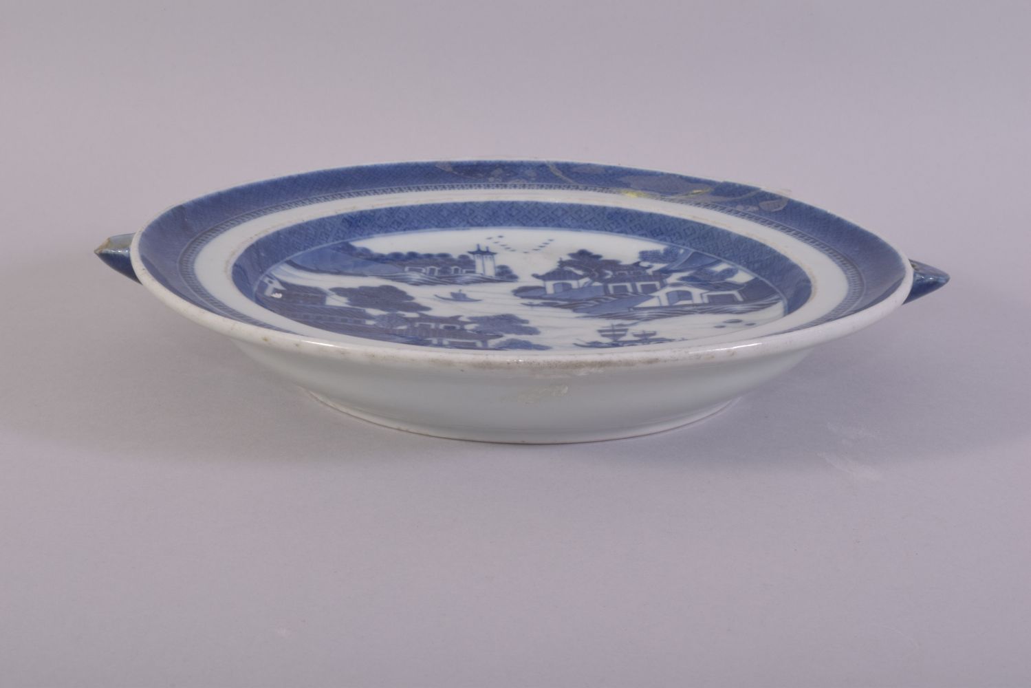 A CHINESE BLUE AND WHITE PORCELAIN WARMING DISH, painted with a landscape scene, 24.5cm. - Image 2 of 3