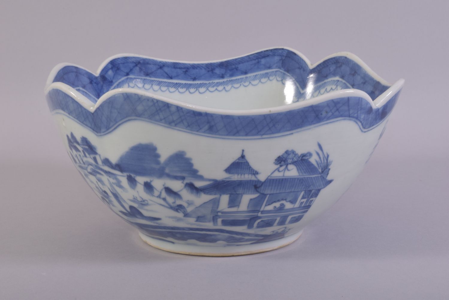 A CHINESE BLUE AND WHITE PORCELAIN BOWL, decorated with a landscape including buildings, boats and - Image 3 of 6