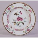 A CHINESE FAMILLE ROSE PORCELAIN PLATE, painted with flowers and a band of floral motifs, 22.5cm