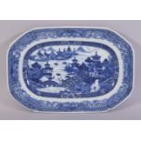 A CHINESE BLUE AND WHITE RECTANGULAR PORCELAIN DISH, the centre painted with a river landscape
