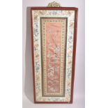 A 19TH CENTURY CHINESE EMBROIDERED SILK PANEL, framed and glazed, 69.5cm x 29cm.