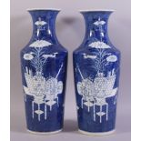 A LARGE PAIR OF CHINESE BLUE AND WHITE PORCELAIN VASES, painted with objects such as a vase on