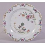 A CHINESE FAMILLE ROSE PORCELAIN PLATE, the centre painted with peacocks, mushrooms and native