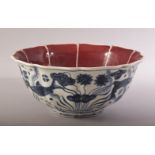 A CHINESE MING STYLE COPPER RED, BLUE & WHITE PORCELAIN LOBED BOWL - the bowl decorated with a