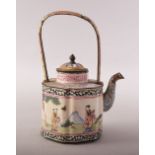 A SMALL CHINESE CANTON ENAMELLED TEAPOT, decorated with a scene of figures in an outdoor setting