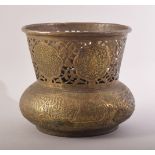 A GOOD ISLAMIC DAMASCUS ENGRAVED OPENWORK BRASS SHALLOW VASE, the body with a band of profusely