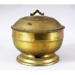 AN INDIAN BRASS LIDDED CIRCULAR POT & COVER - 21cm