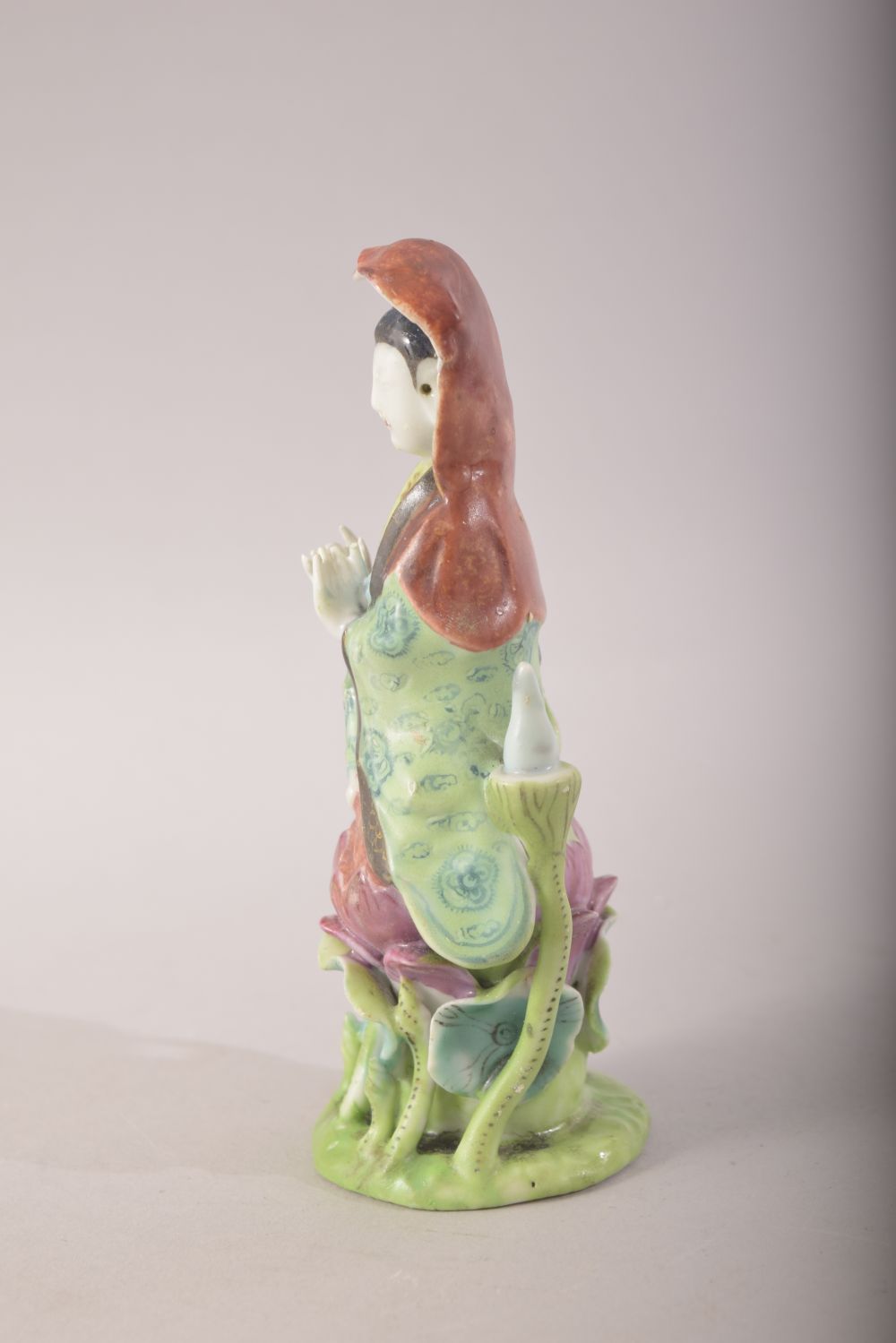 A SMALL CHINESE PORCELAIN FIGURE OF A FEMALE amongst lilies, 13cm high. - Image 4 of 7