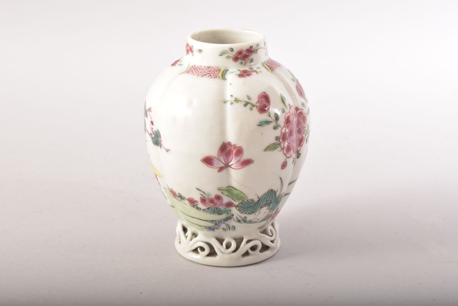 A SMALL CHINESE FAMILLE ROSE CADDY / VASE, painted with flowers with pierced vine base, 9.5cm high. - Image 3 of 6
