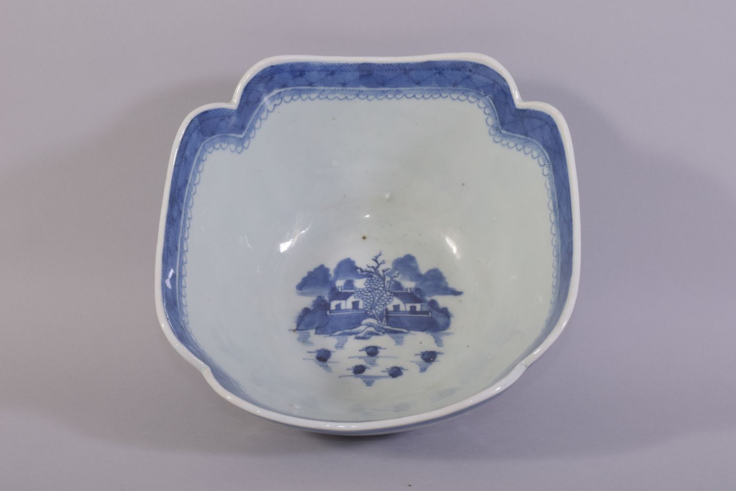 A CHINESE BLUE AND WHITE PORCELAIN BOWL, decorated with a landscape including buildings, boats and - Image 5 of 6