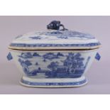 A CHINESE BLUE AND WHITE PORCELAIN TUREEN AND COVER, decorated with landscape scenes including