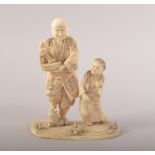 A JAPANESE CARVED IVORY FIGURE OF MAN WITH FISH and a boy at his side, 10cm high.