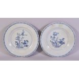 A PAIR OF CHINESE BLUE AND WHITE PORCELAIN PLATES, 22.5cm diameter.