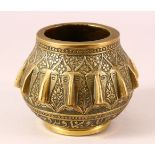 A 19TH CENTURY PERSIAN QAJAR ENGRAVED BRONZE MORTAR - with multi head decoration 12cm