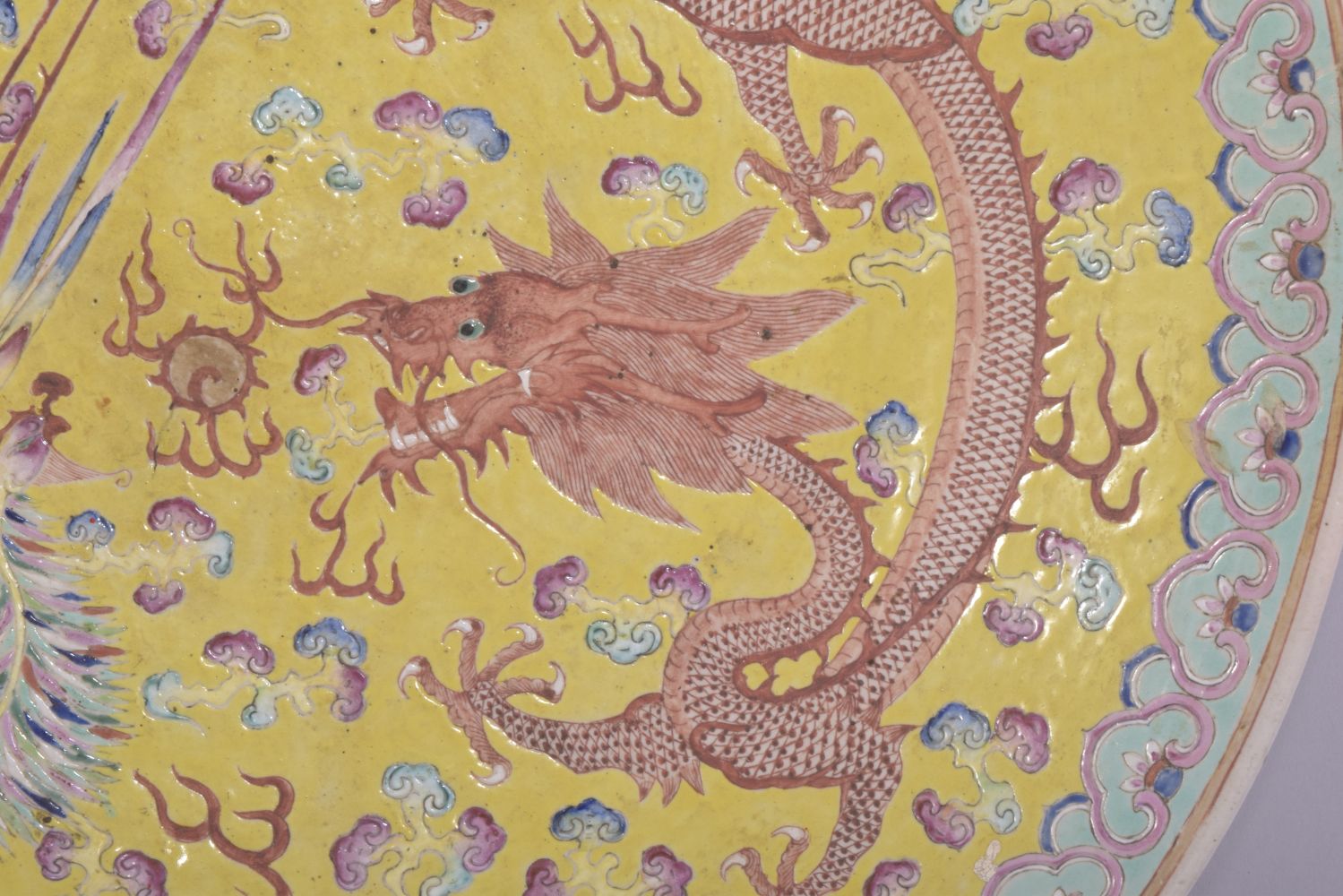 A LARGE CHINESE FAMILLE JAUNE PORCELAIN DISH, the centre painted with dragon, phoenix and the - Image 2 of 5