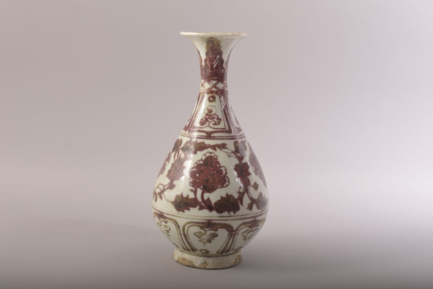 A CHINESE IRON RED AND WHITE GLAZED POTTERY VASE, decorated with floral motifs, 24.5cm high. - Image 3 of 6