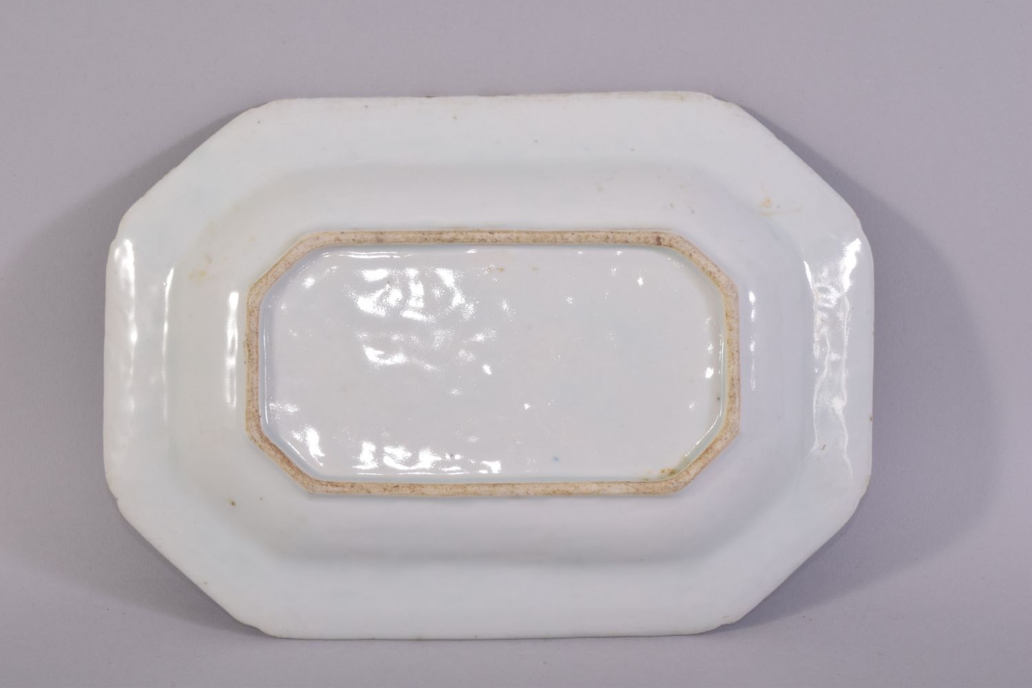 A CHINESE BLUE AND WHITE RECTANGULAR PORCELAIN DISH, the centre painted with a mountainous landscape - Image 2 of 2