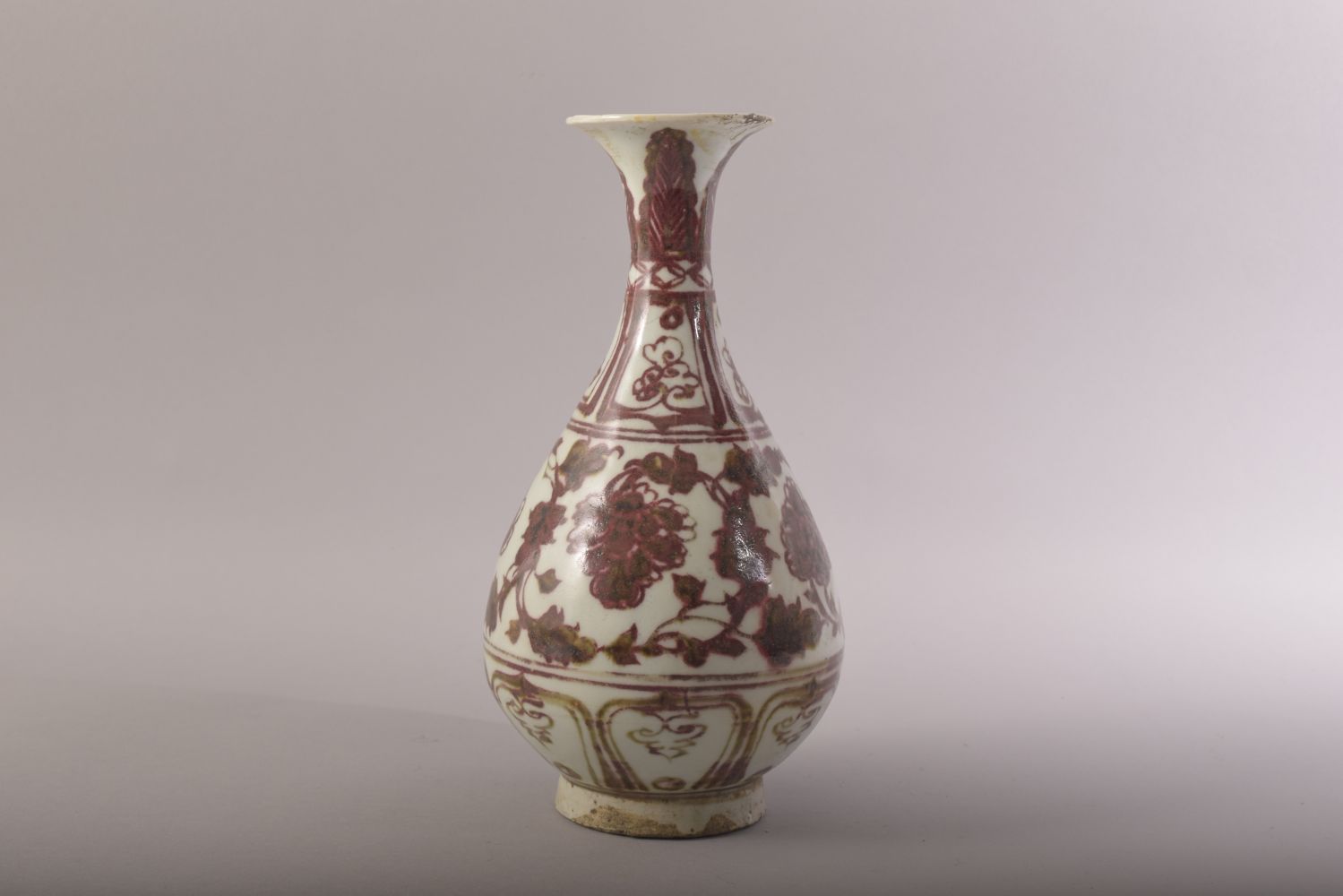 A CHINESE IRON RED AND WHITE GLAZED POTTERY VASE, decorated with floral motifs, 24.5cm high. - Image 2 of 6