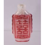 A CHINESE RED GLASS SNUFF BOTTLE, 6.5cm.