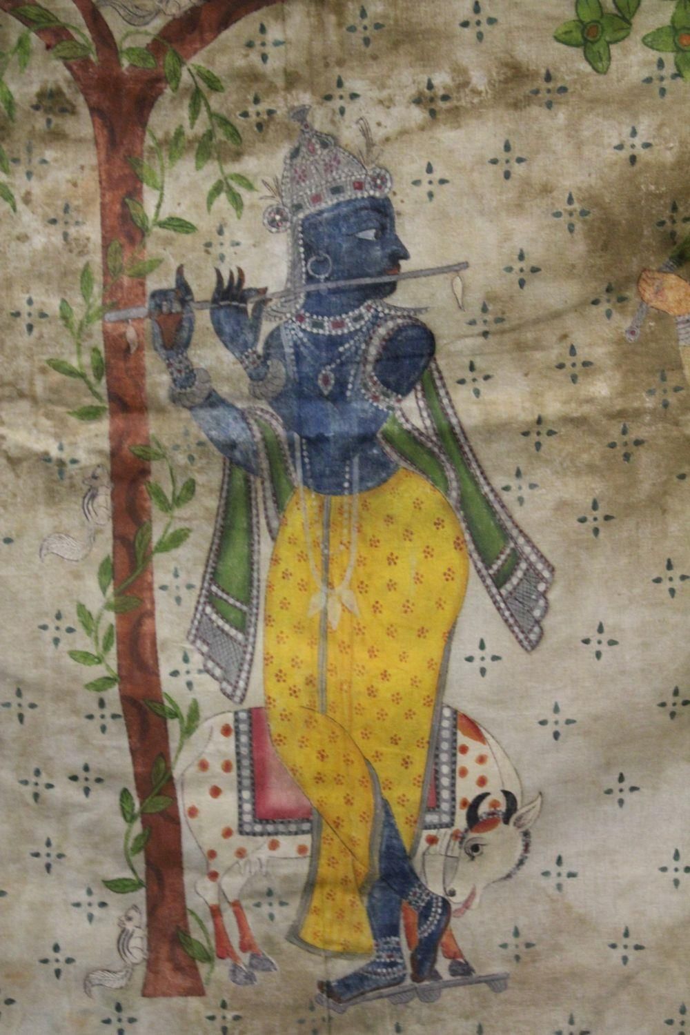 A INDIAN PICHWAI PAINTING ON COTTON, the painting depicting a blue god playing the flute with - Image 2 of 5