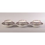 A SET OF THREE CHINESE FAMILLE ROSE PORCELAIN CUPS AND SAUCERS, cups 7.5cm diameter, saucer 12cm