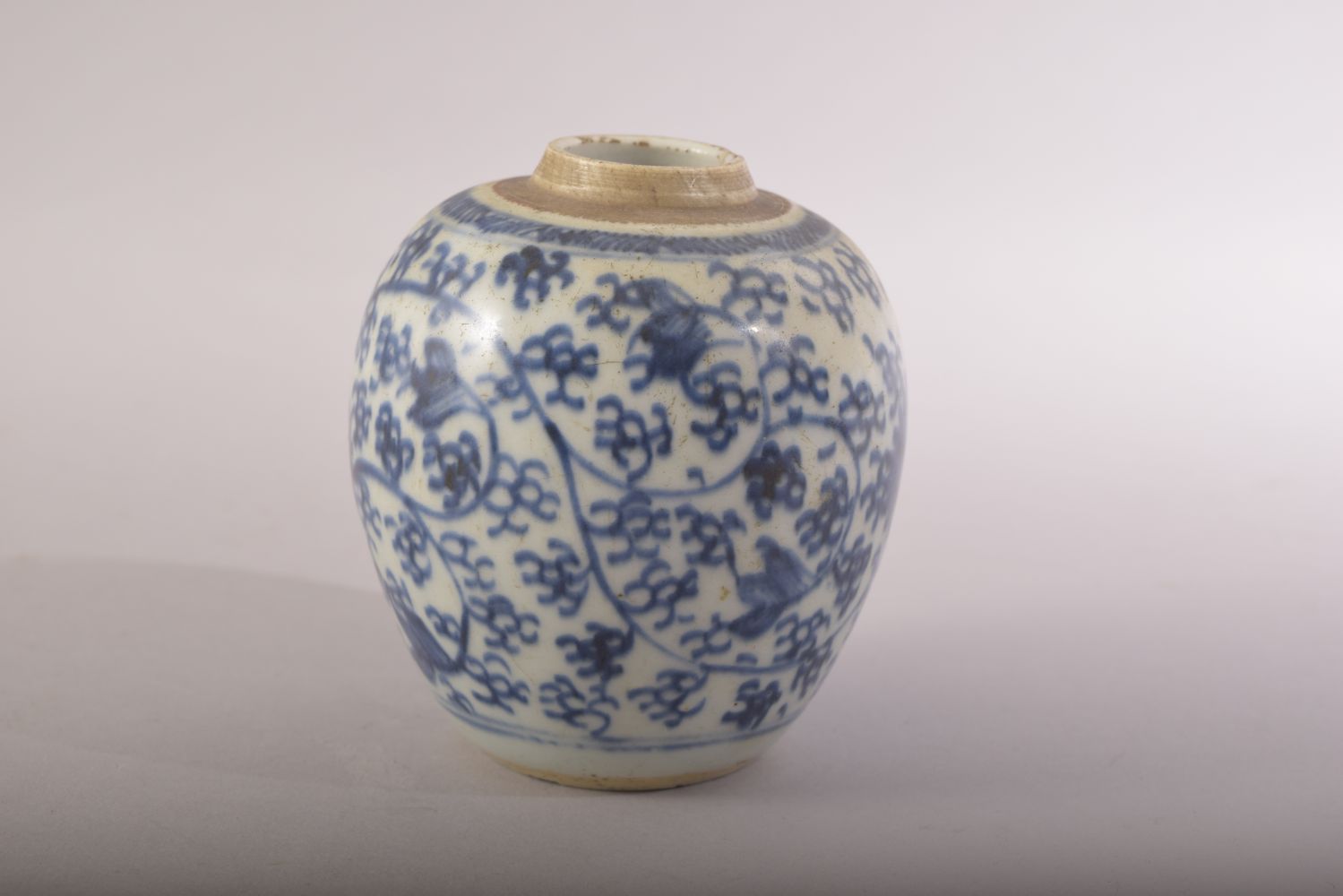 A SMALL CHINESE BLUE AND WHITE VASE, with foliate decoration, 9.5cm high. - Image 2 of 6