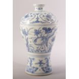 A CHINESE BLUE AND WHITE MING STYLE MEIPING VASE, decorated with cranes, flowers and stylised waves,