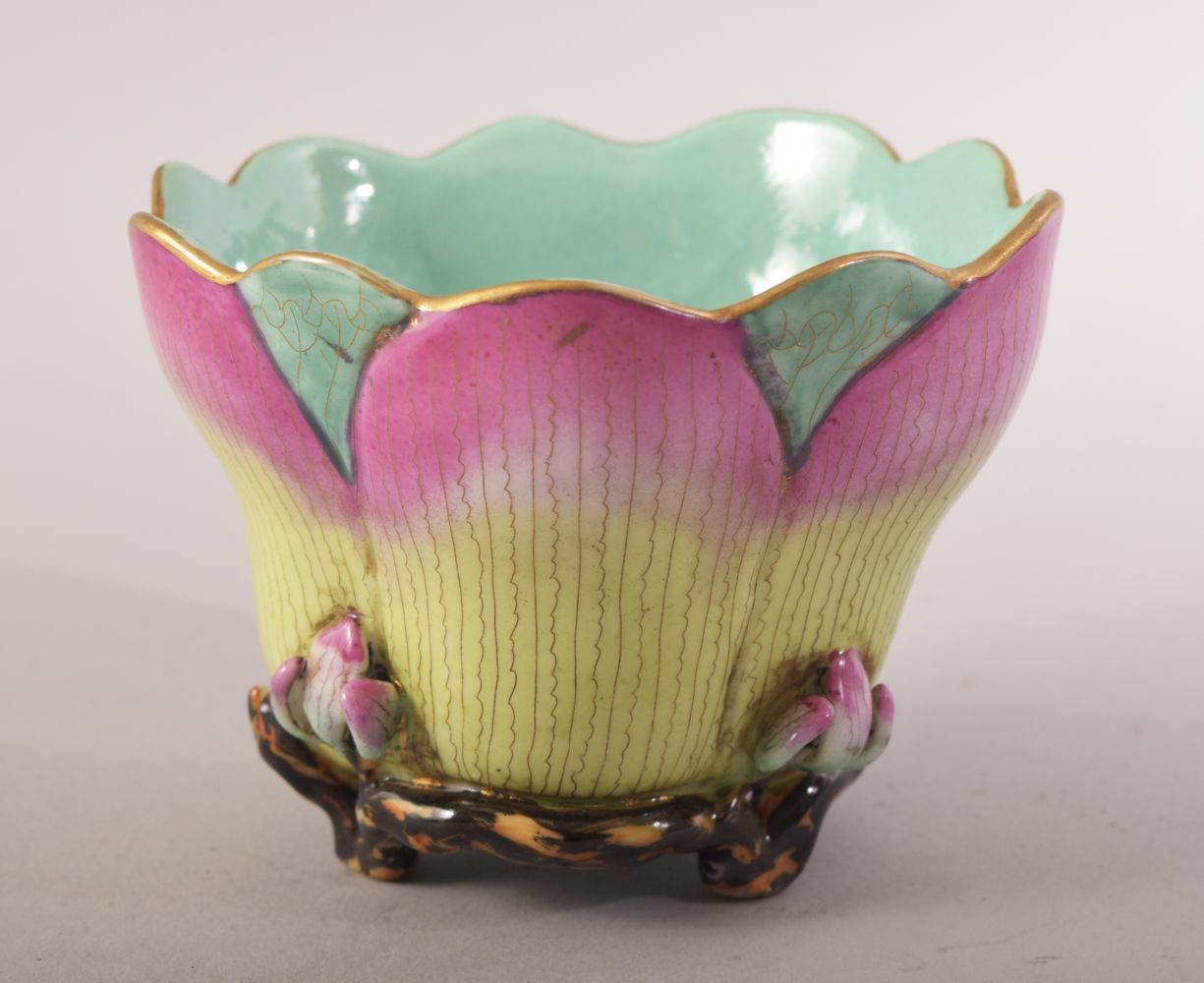 A CHINESE FAMILLE ROSE AND TURQUOISE GROUND PORCELAIN CUP, the cup with flower / petal form and with