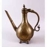 A LARGE 18TH CENTURY MUGHAL INDIAN BRASS EWER, 38cm high.